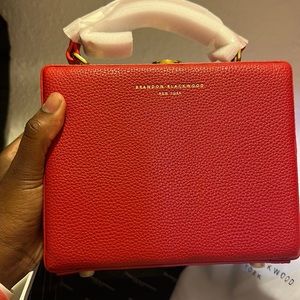 Brandon Blackwood faux leather trunk